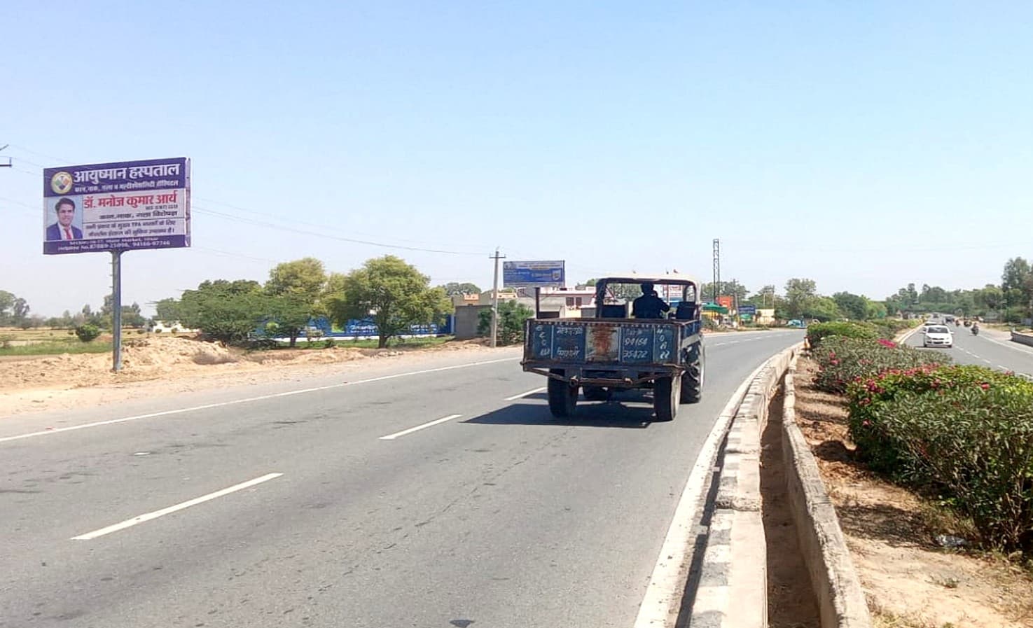 Chandigarh Road Hisar Exit (Baddo Patti Bus Stand) hoarding 1